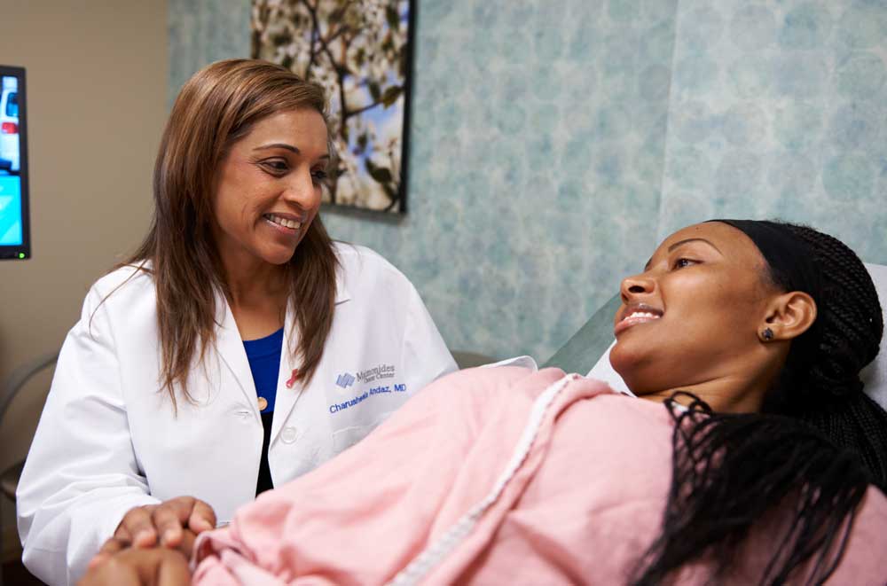 Doctor looking at patient smiling