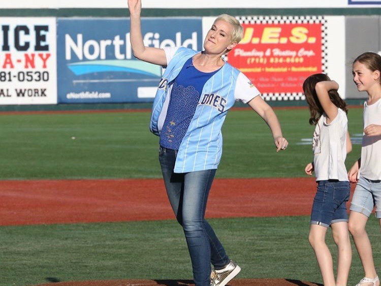 person throwing the first pitch