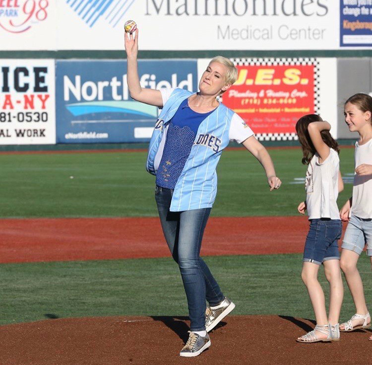 person throwing the first pitch
