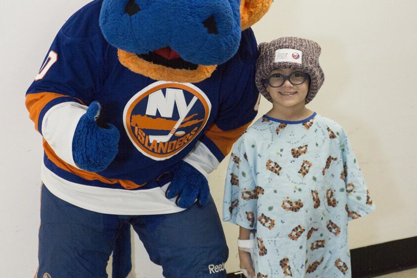 NY Islanders mascot with child