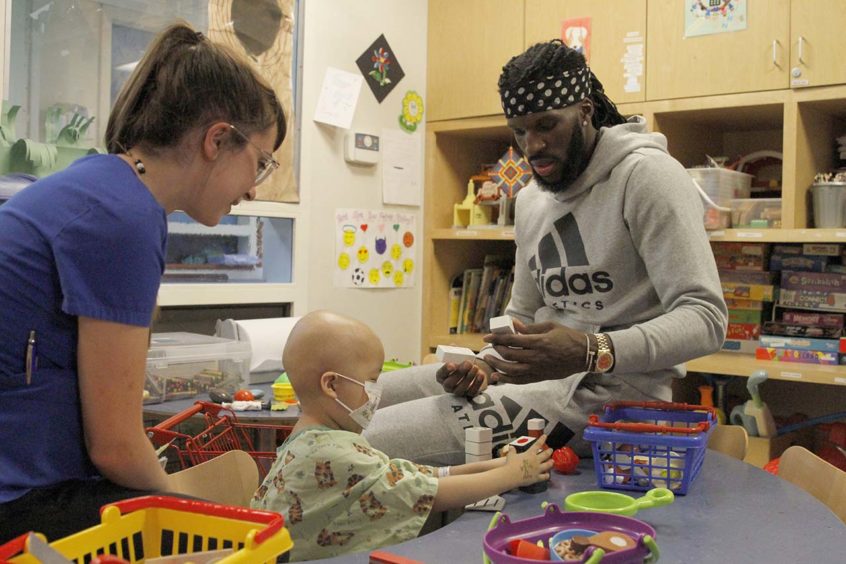 DeMarre Carroll Visits Pediatric Patients