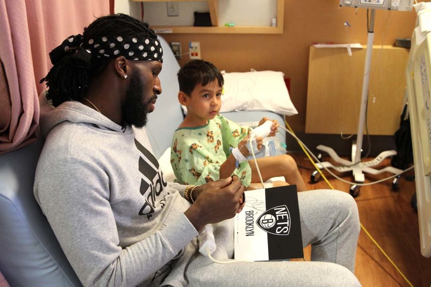 DeMarre Carroll Visits Pediatric Patients