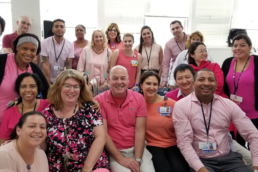 group photo wearing pink