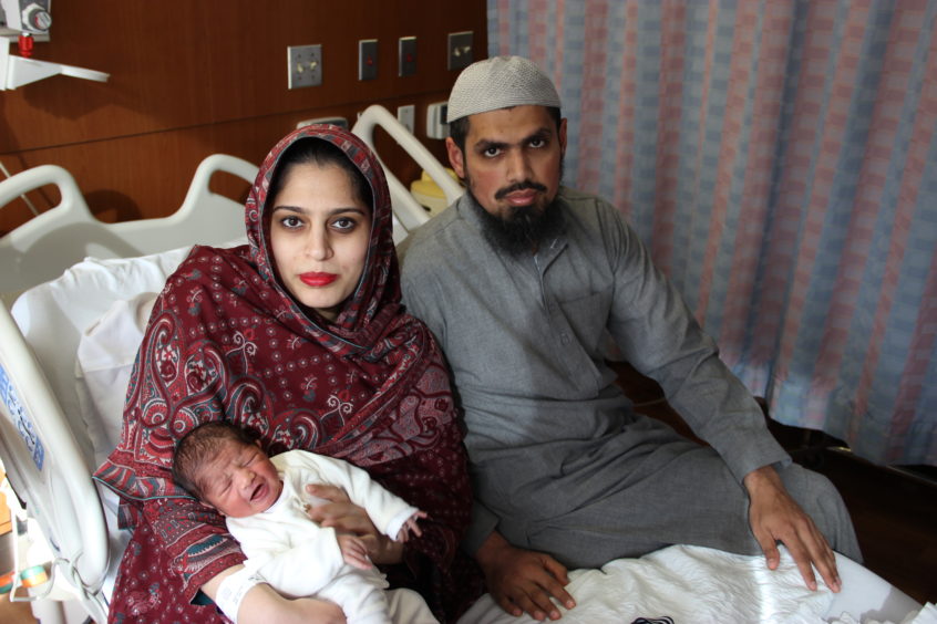couple with new born