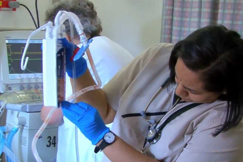 nurse using medical equipment